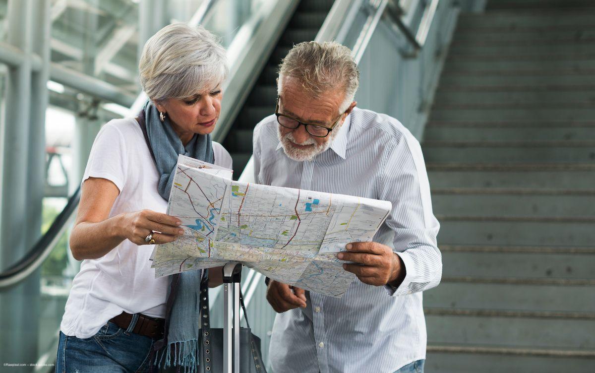 Two elderly people look at a map. Image credit: ©Rawpixel.com – stock.adobe.com