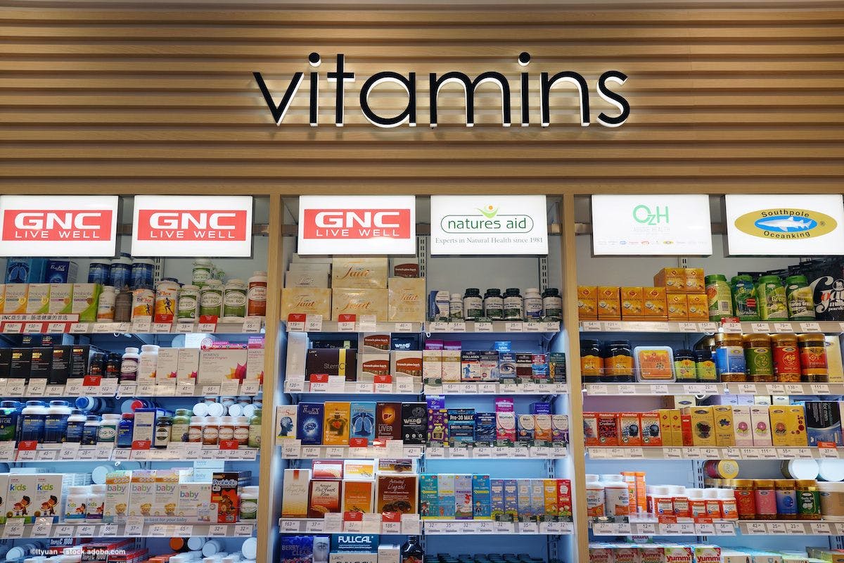 Vitamins for sale in a retail store. Image credit: ©ltyuan – stock.adobe.com