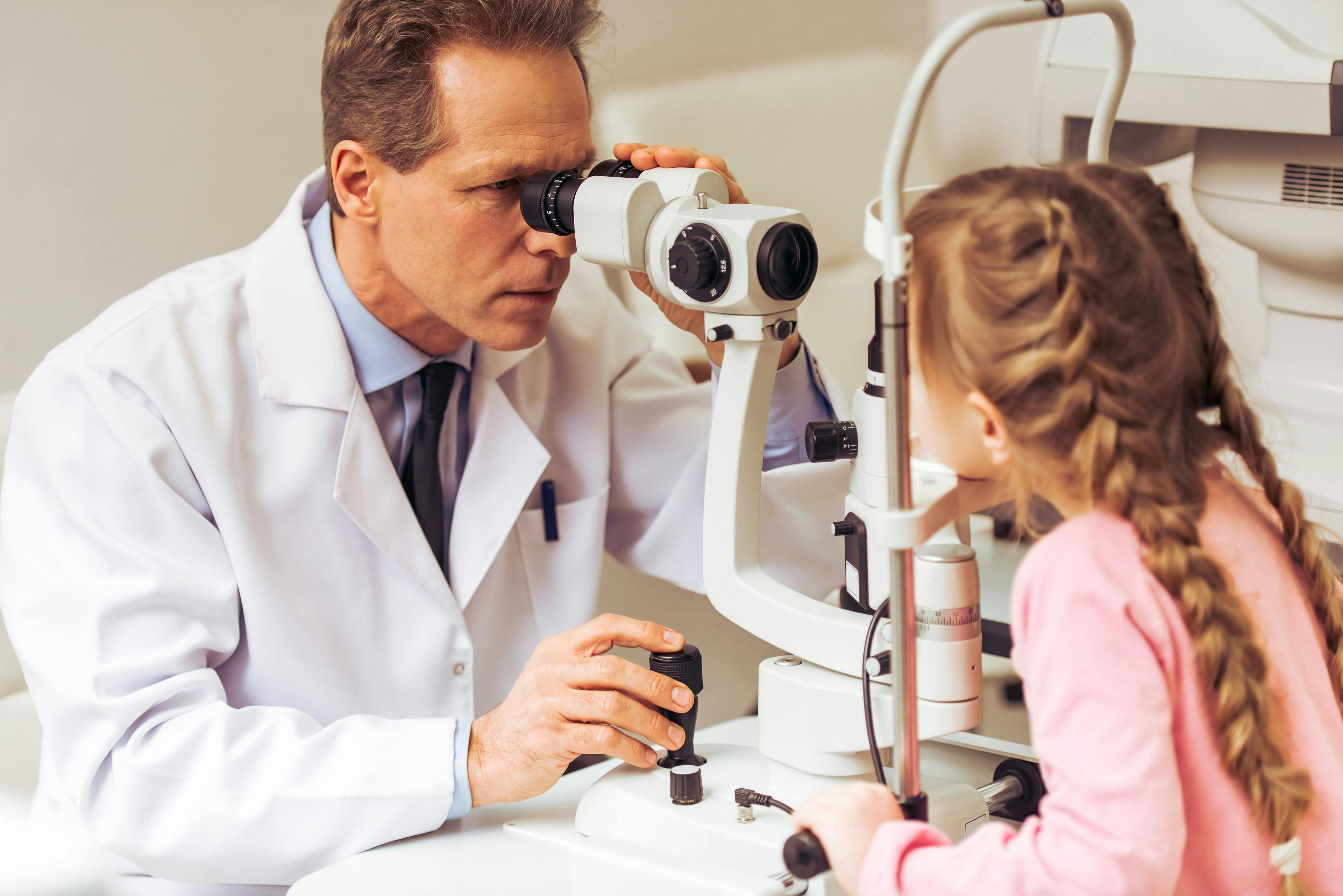 little girl getting an eye exam