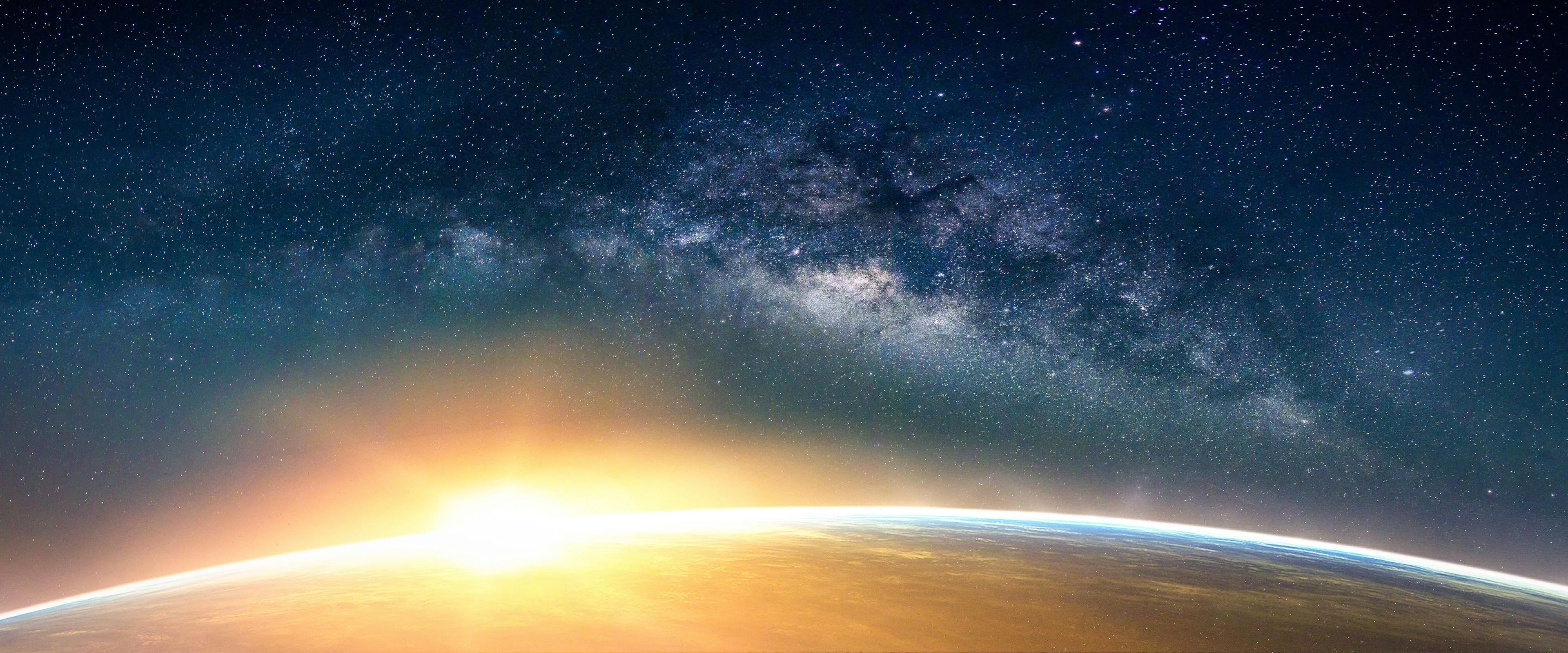 Sunrise and Earth view from space with Milky way galaxy 