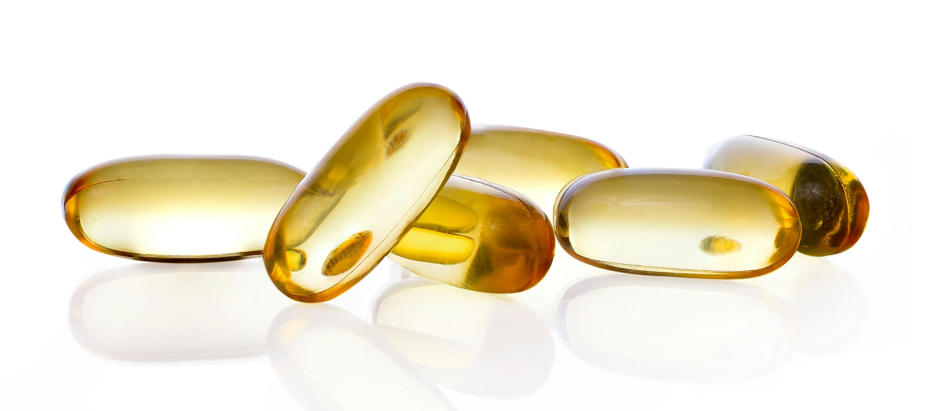 close up of vitamin D capsules