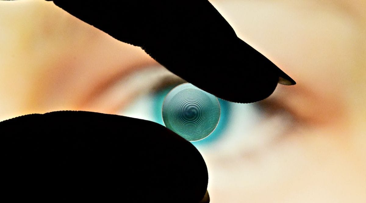The new spiral diopter lens could be used on contact lenses (shown here, held in front of an eye), in intraocular implants for cataracts and to create new types of miniaturised imaging systems. Image credit: Laurent Galinier
