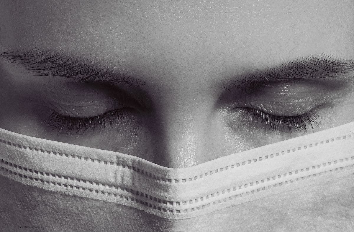 A patient with a mask has closed eyes. Image credit: ©Ayman Alakhras – stock.adobe.com