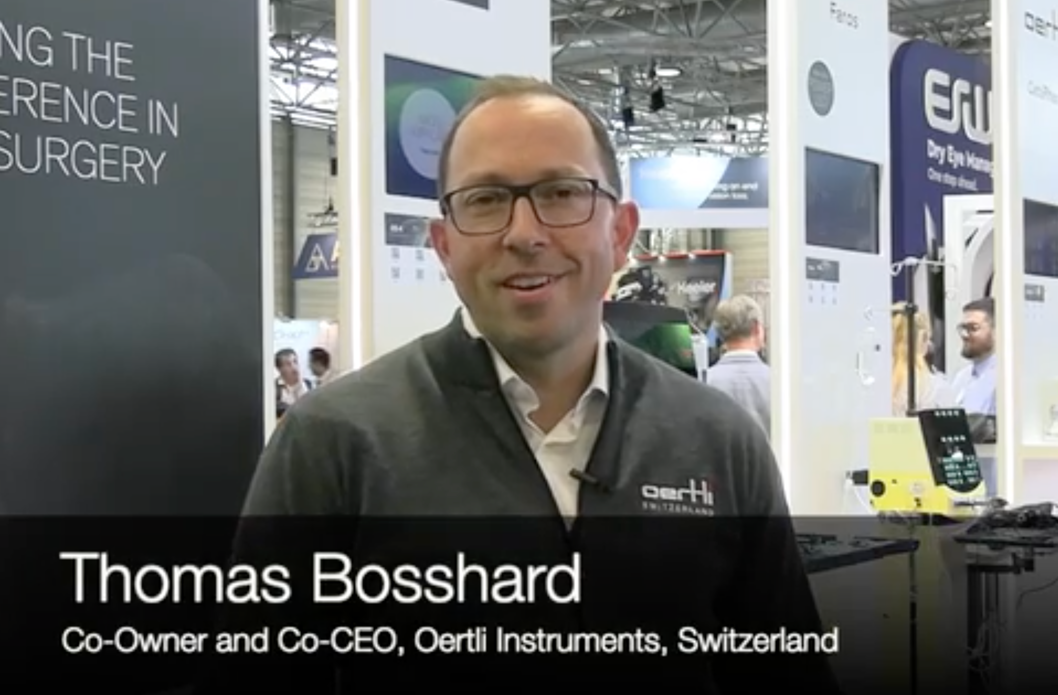 Thomas Bosshard stands at the Oertli Instruments booth at the ESCRS meeting