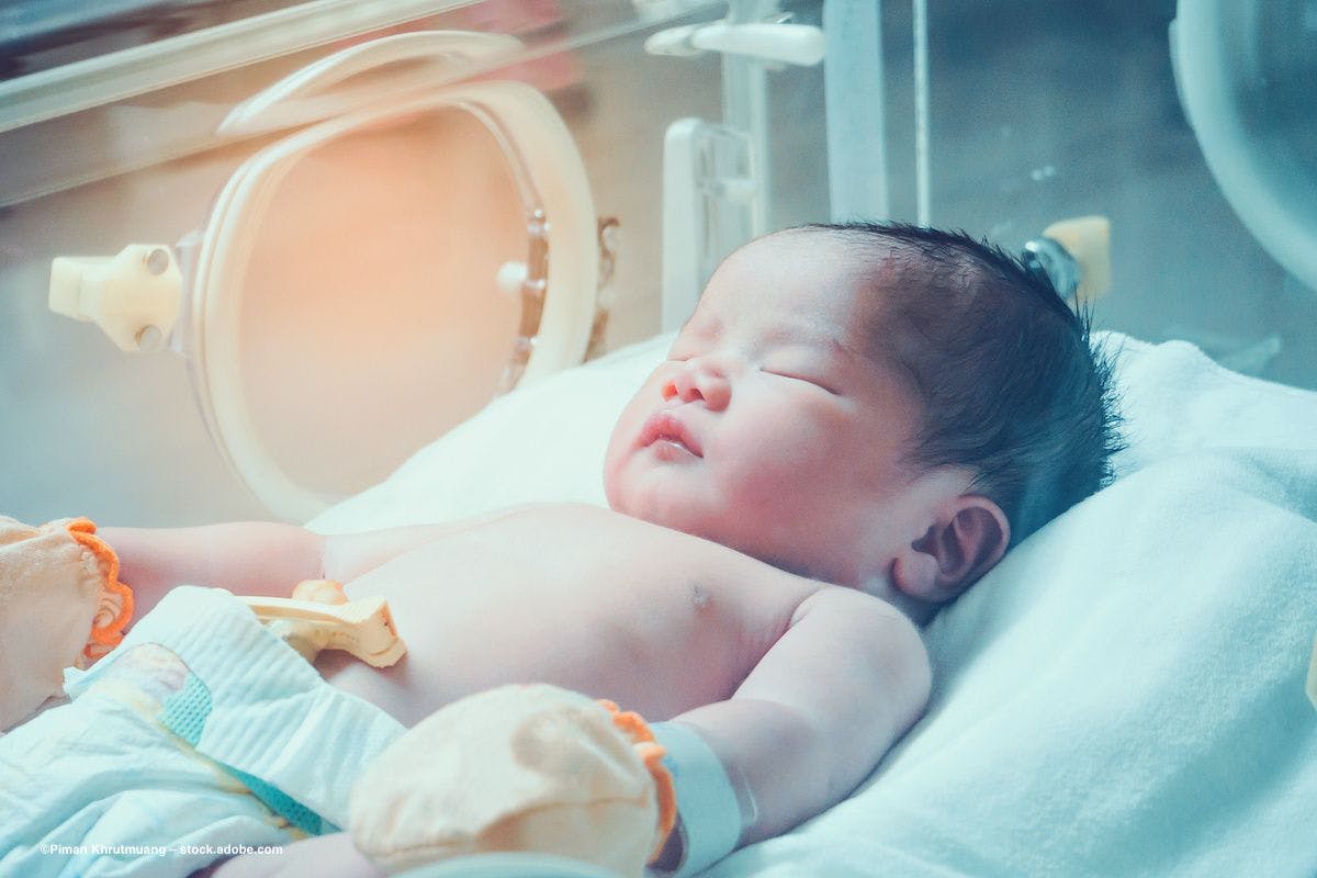 A newborn baby in an incubator in a hospital. Image credit: ©Piman Khrutmuang – stock.adobe.com