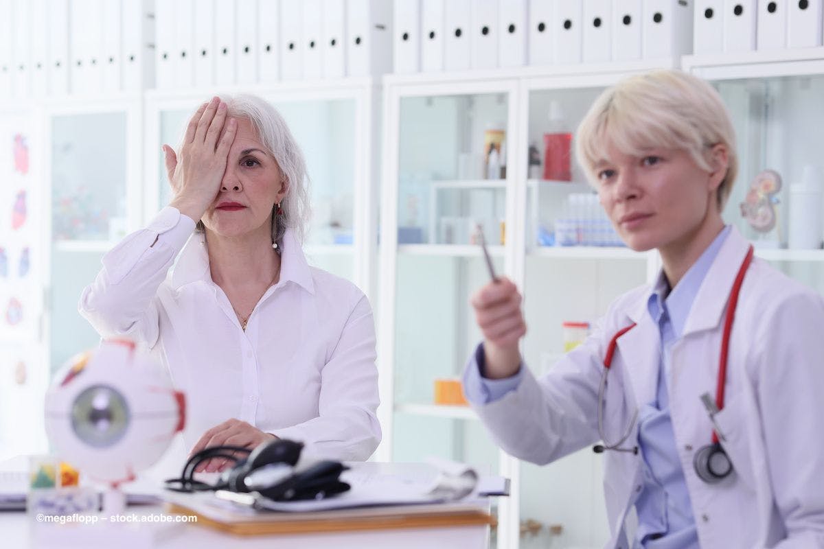A patient covers her eye to perform a Snellen chart test as the optometrist looks on. Image credit: ©megaflopp – stock.adobe.com