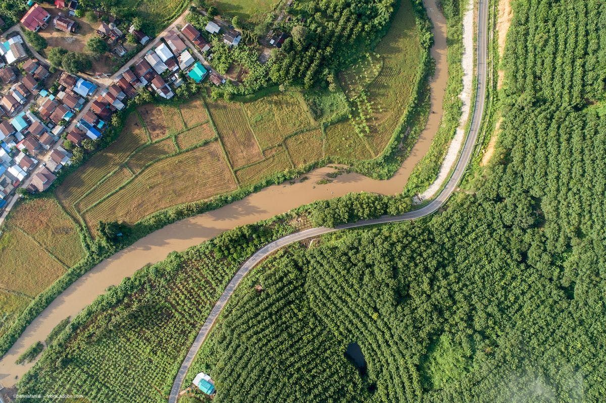 An aerial view of a rural community in Thailand. ©bannafarsai – stock.adobe.com