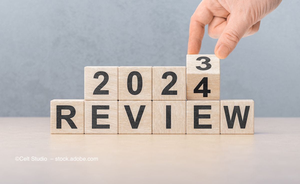 Wooden blocks read "2023 Review," as the year 2023 turns to 2024. Image credit: ©Celt Studio – stock.adobe.com