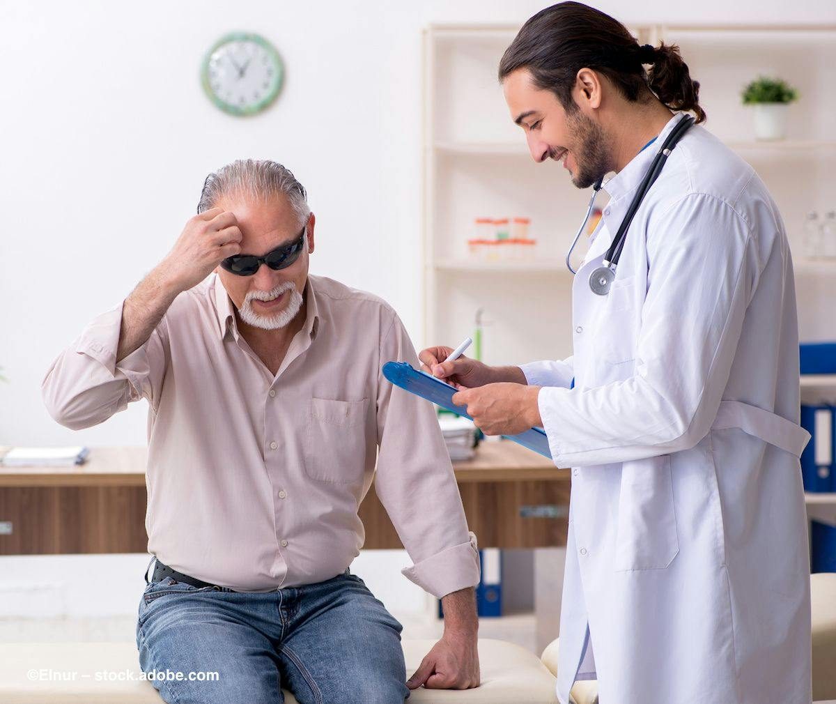 A physician helps a man in sunglasses during an office visit. ©Elnur – stock.adobe.com