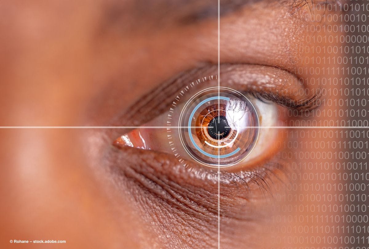 A closeup of a brown eye with a series of binary numbers in the background. Image credit: © Rohane/Adobe Stock